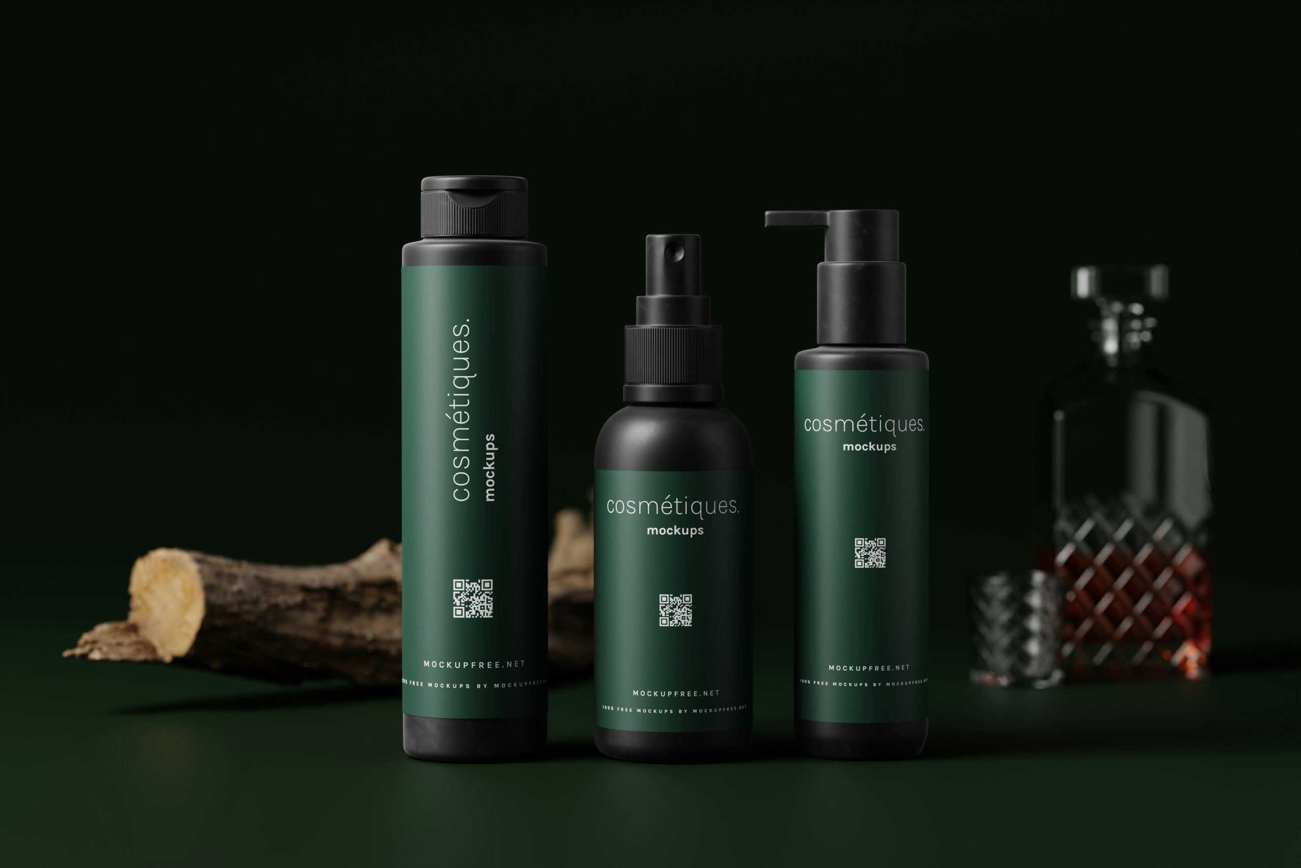 Bottles of clean makeup with natural ingredients like jojoba oil and shea butter displayed beside green plants.