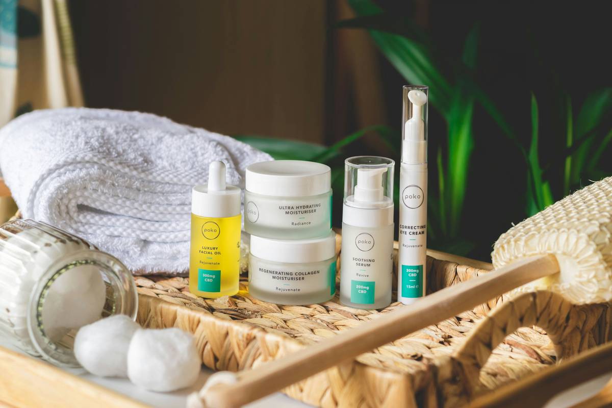 Clean skincare products on wooden table