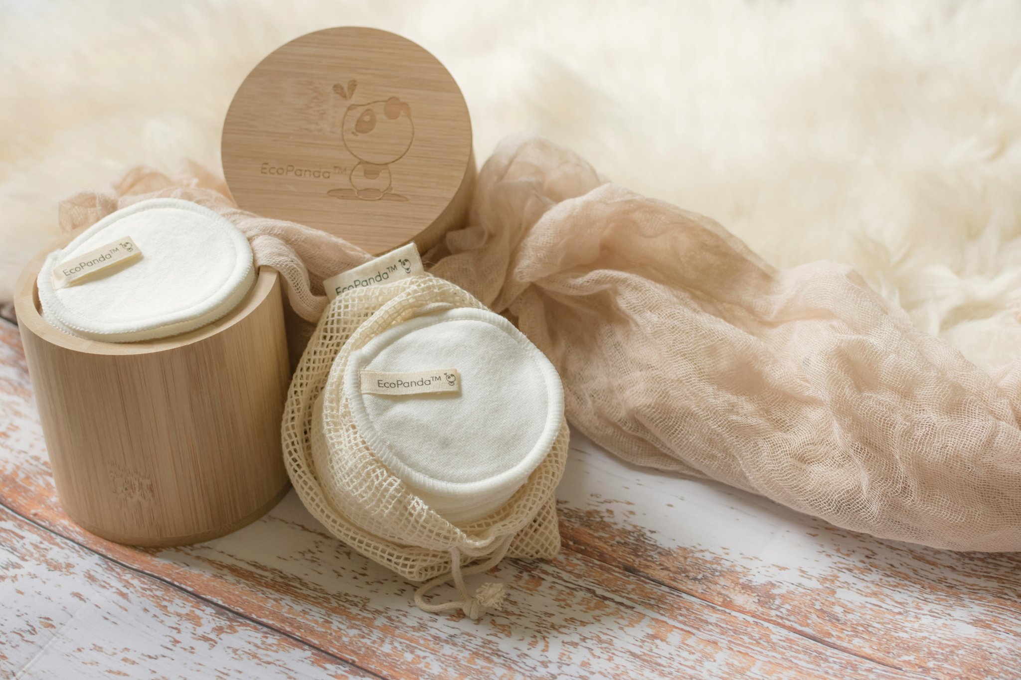 Empty biodegradable makeup containers being composted