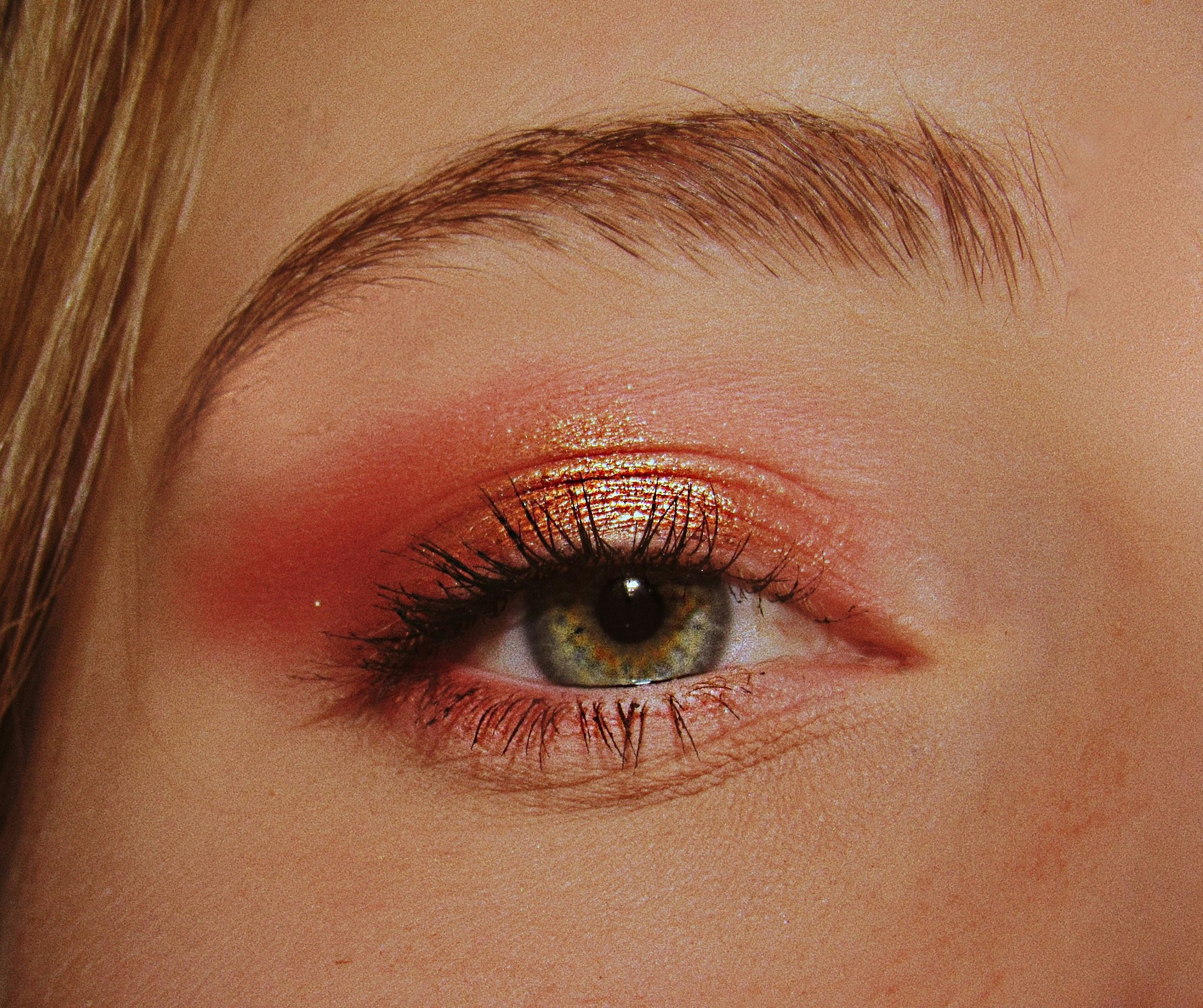 Close-up image of minimalist makeup packaging with short ingredient label